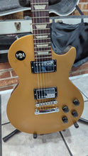 Load and play video in Gallery viewer, Gibson Les Paul &#39;60s Tribute Humbucker with Manual Tuners 2013 - Gold Top/Dark Back
